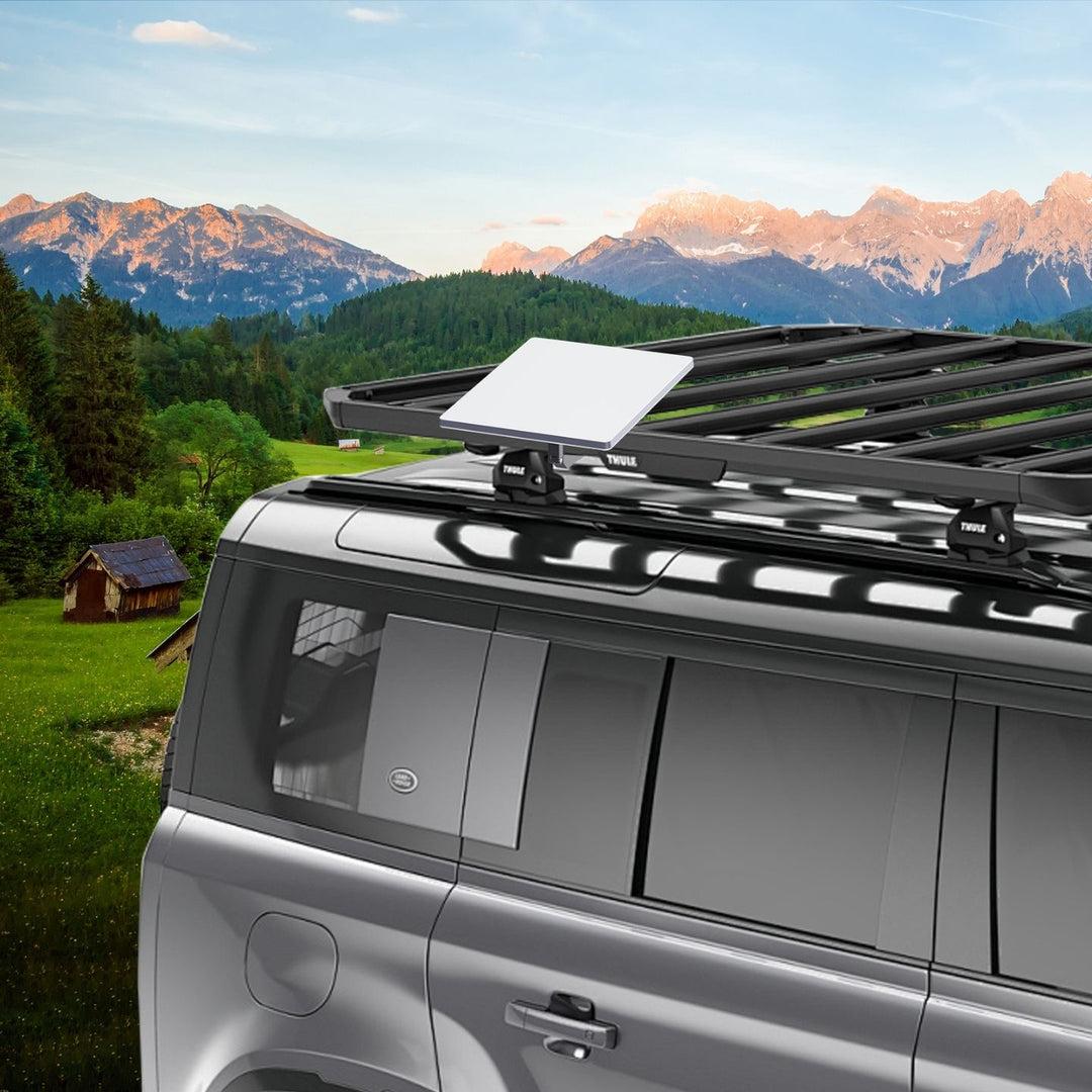 Mountain scenery with a vehicle roof-rack setup, shown as a third-party scene reference